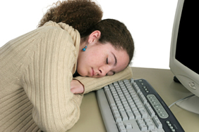 teen sleeping at desk
